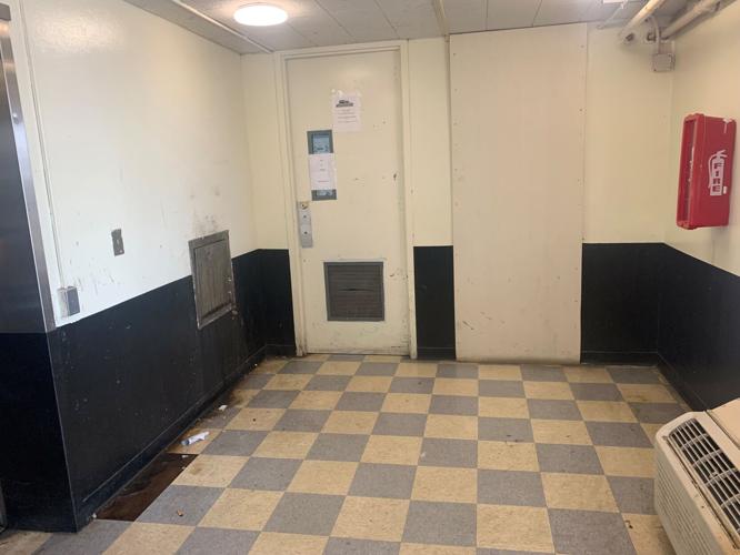 Dirty hallway at Dosker Manor