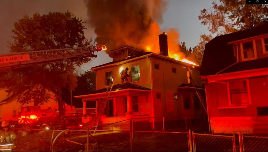 Firefighters at house in Shawnee neighborhood.JPG