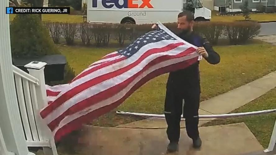 FEDEX WORKER STOPS TO FOLD FLAG 1130 VO