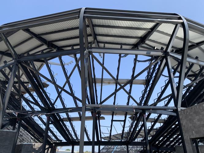 Crews finish laying the steel structure for the stadium roof