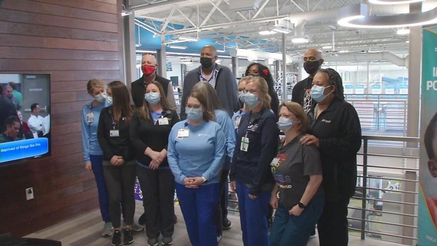 Former Louisville basketball players at a Norton Healthcare vaccine clinic