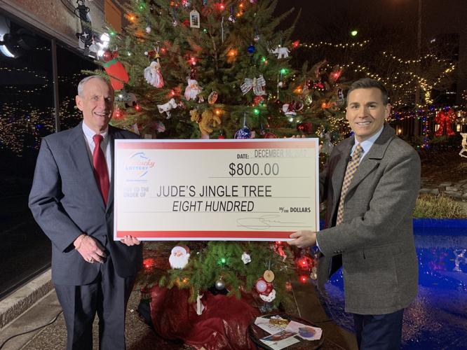 Jude and Lottery check.jpg