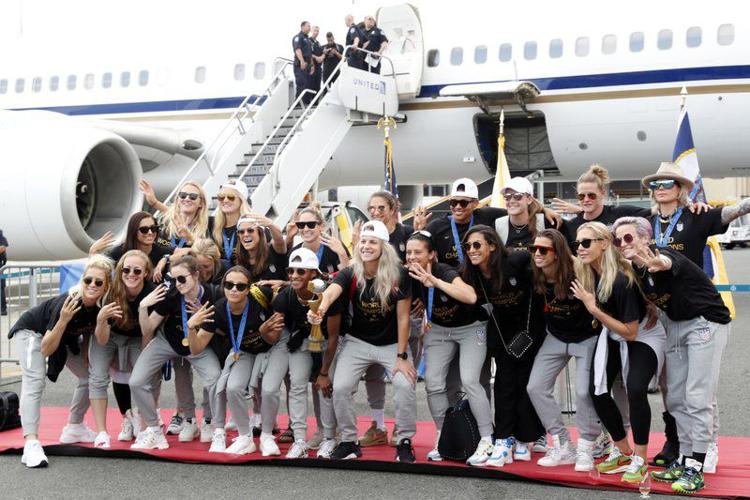 US WOMEN SOCCER WORLD CUP CHAMPS ARRIVE HOME - AP - 7-8-19 4.jpeg