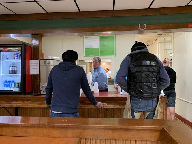 Lee helps customers.jpg