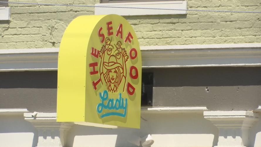 Phoenix Hill Seafood Lady sign