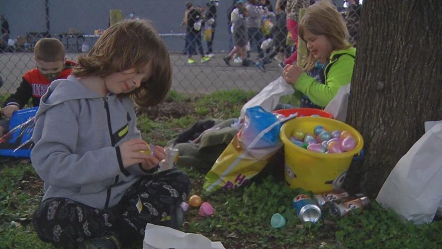 Children open up Easter eggs.jpeg