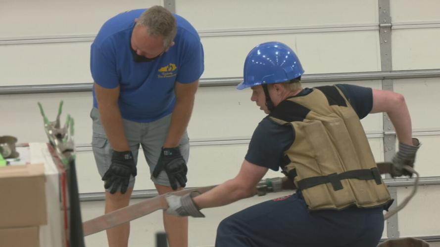 Prospective firefighters take physical agility test in Louisville on Oct. 12, 2021
