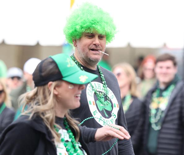 Green afro at parade