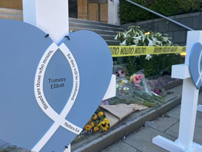 Lutheran Church Charities adds crosses, hearts to memorial outside Old National Bank