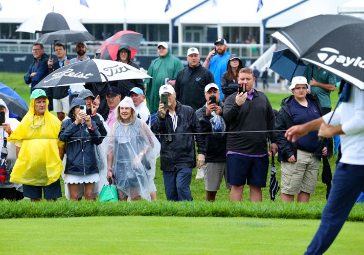 Scottie Scheffler walks on 13th fairway.JPG