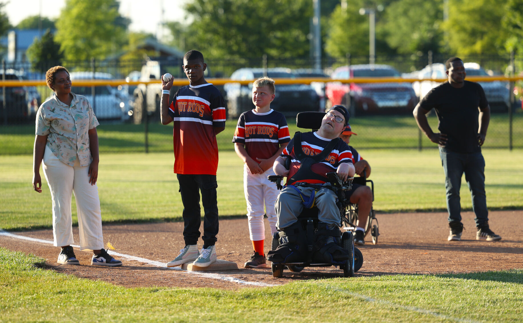 Clarksville Challenger players wait at third base.JPG