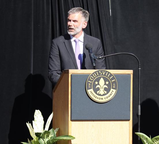 Councilmember Markus Winkler speaks during vigil.JPG