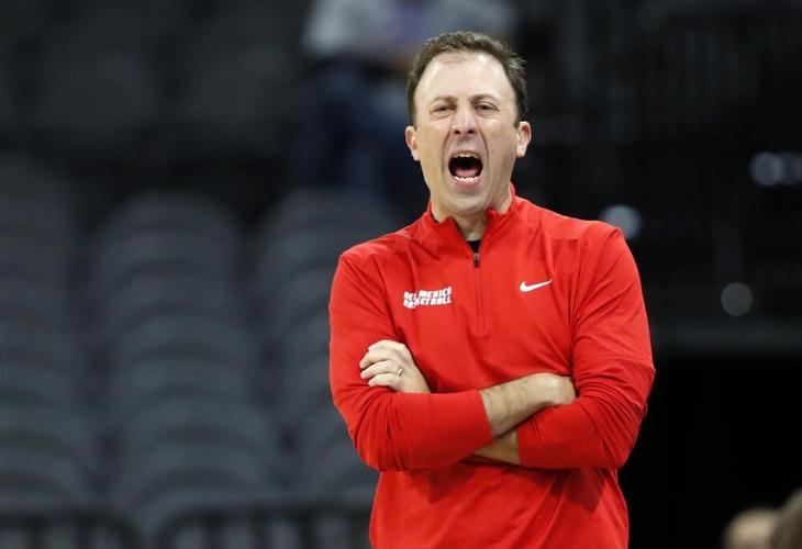 New Mexico head coach Richard Pitino calls out to players.jpg