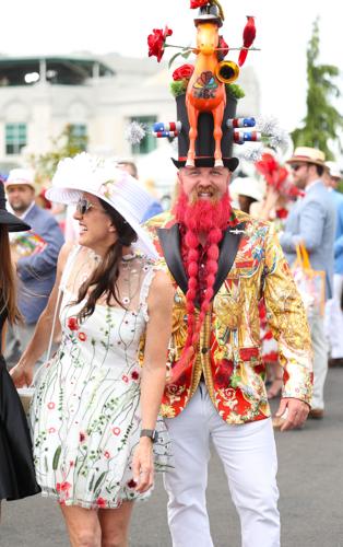 Bearded man shows off hat.JPG