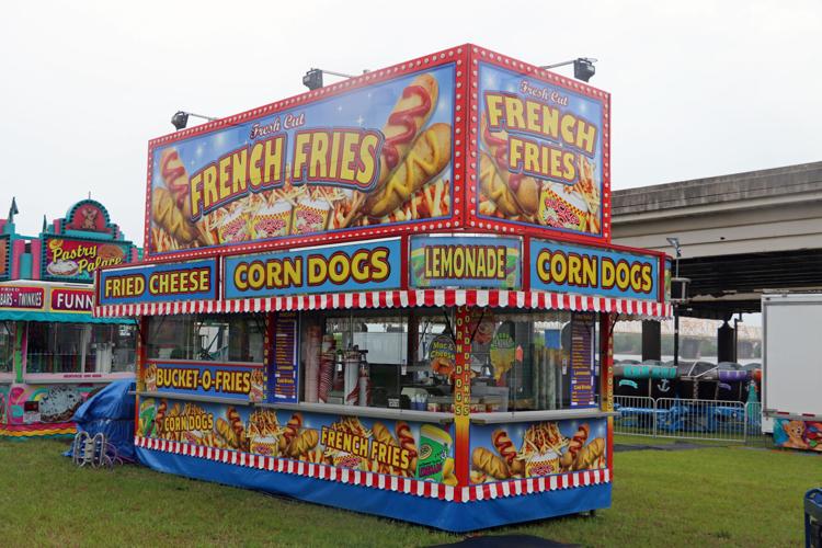 Crews set up booths along the Ohio River one day before Thunder Over Louisville 2023