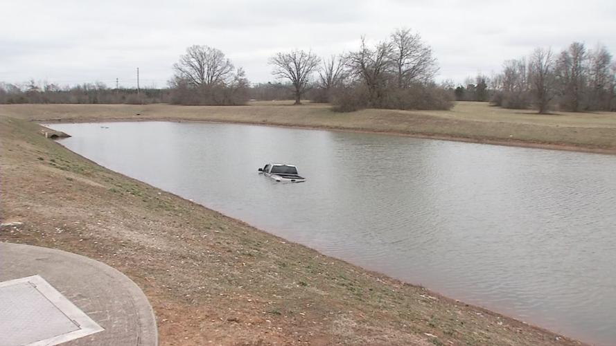 Truck in pond at Louisville appliance park