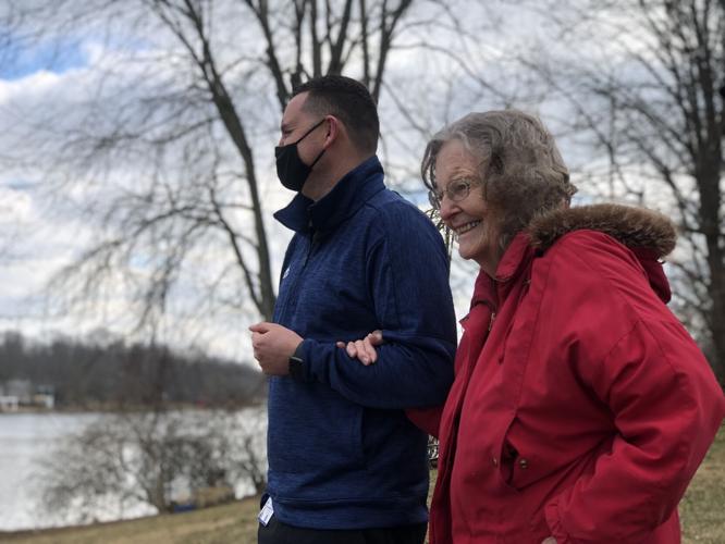 Dr. Jenkins walks with patient Marilynn Maxwell