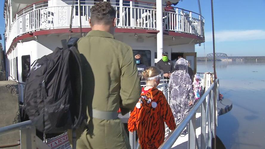 People board the Belle of Louisville for a Halloween event