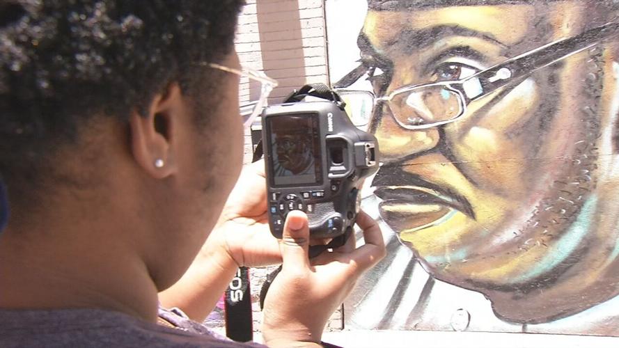 Taking photo of McAtee mural.jpg