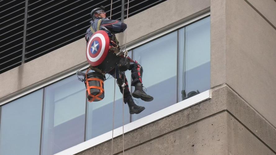 Window washers rappel from Norton Children's Hospital dressed as superheroes