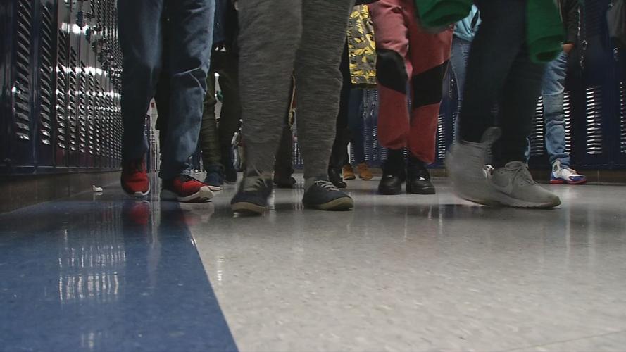 Generic students in school hallway