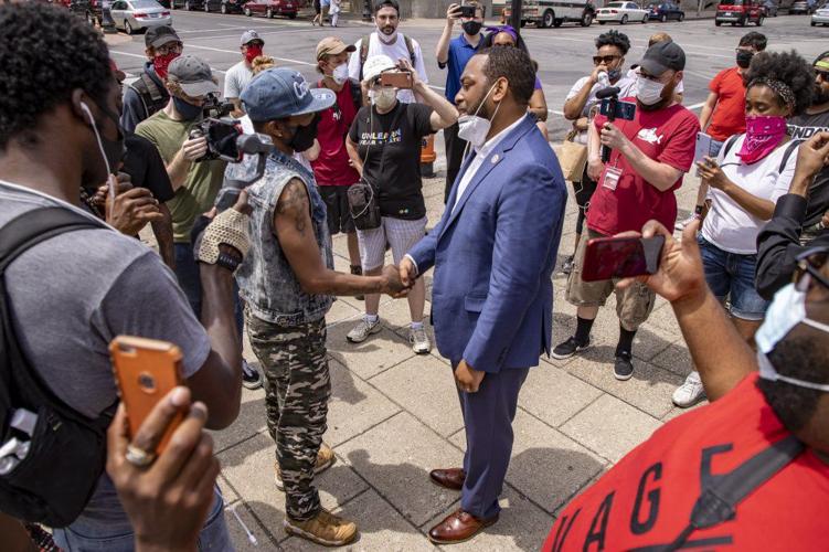 Charles Booker with protesters in Louisville-AP.jpeg