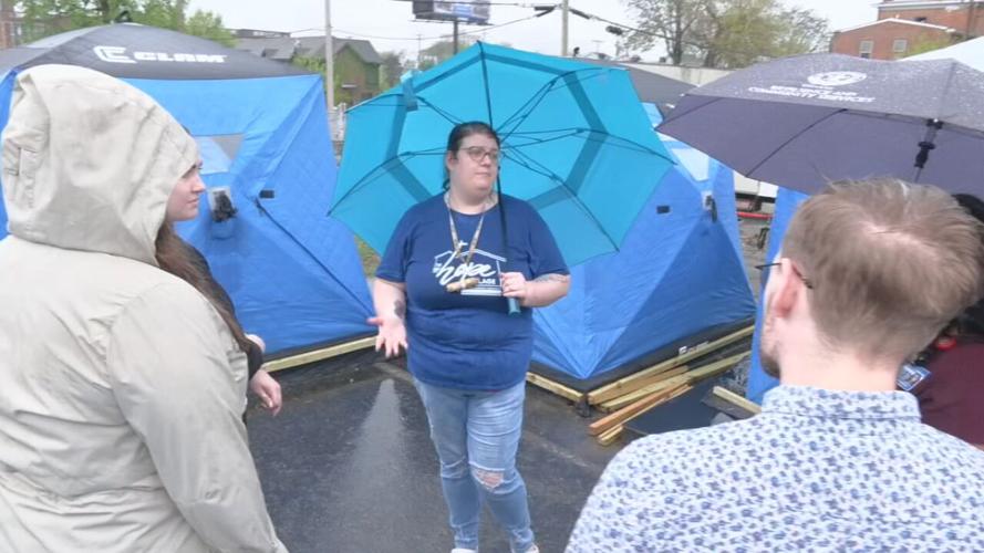 Sara Turney gives tours during open house for the Hope Village