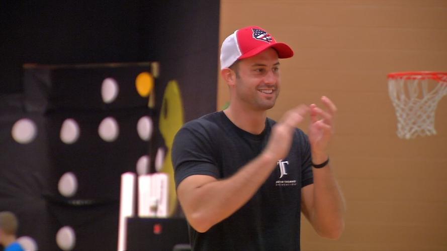 Former U of L basketball player Luke Hancock at his basketball camp