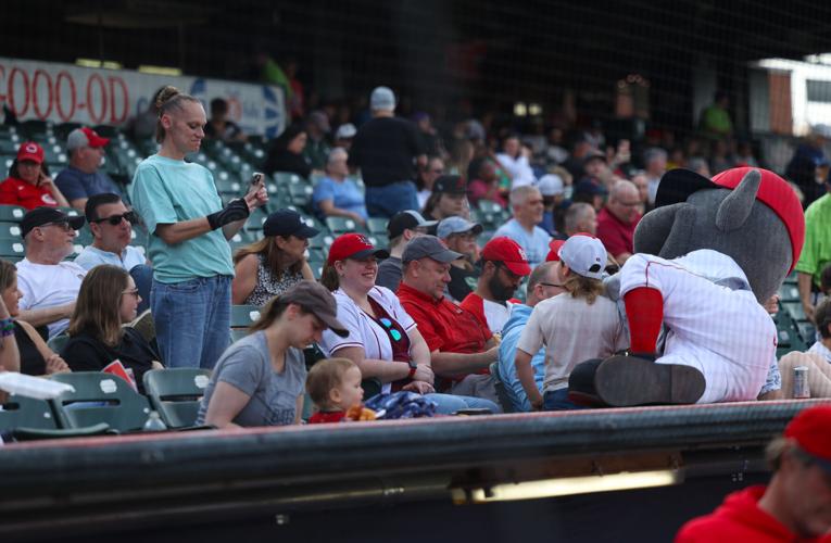 Buddy bat poses with fans.JPG