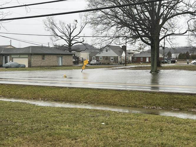 Front yards flooded at homes near Highway 44 in Bullitt County on Jan. 3, 2023