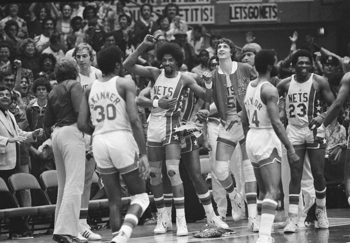 Julius Erving, Kim Hughes