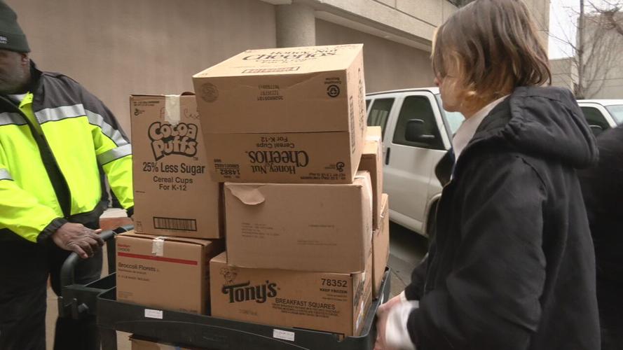 Alton middle schoolers unload care packages for cancer patients