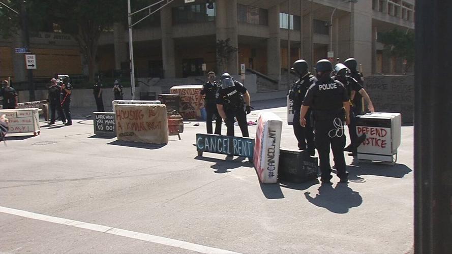 Anti-eviction protests LMPD starting to move furniture