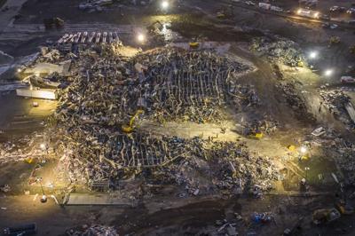 Search and rescue crews at the Mayfield Consumer Products candle factory.jpeg