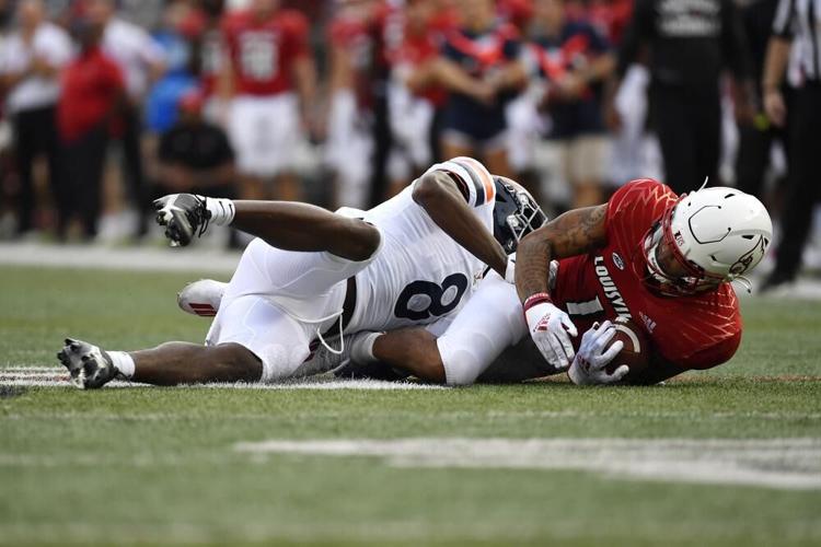 Hassan Hall tackled against Virginia.jpeg