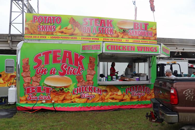 Crews set up booths along the Ohio River one day before Thunder Over Louisville 2023