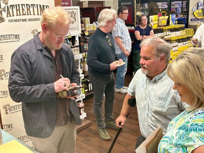 Jim Gaffigan at Middletown Kroger signing bourbon bottles - 9.14.25