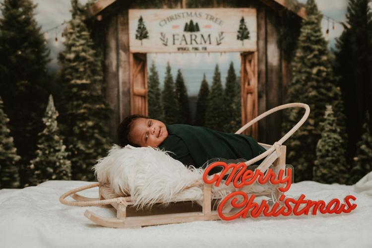 Baptist Health Louisville NICU baby in holiday outfit