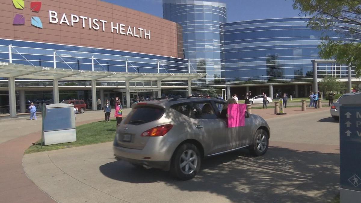 Floyd County Employees Organize Caravan Past Baptist Health Floyd To Show Support For Nurses Combating Covid 19 News Wdrb Com