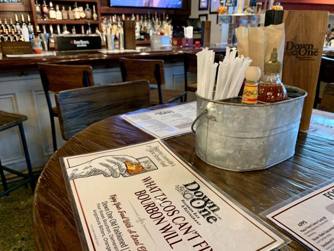Down One Bourbon Bar menu on table