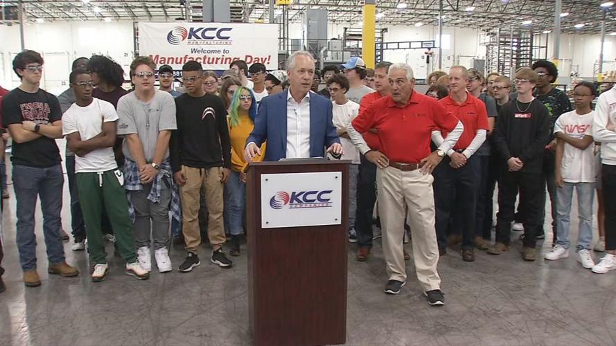 Fischer at podium manufacturing day