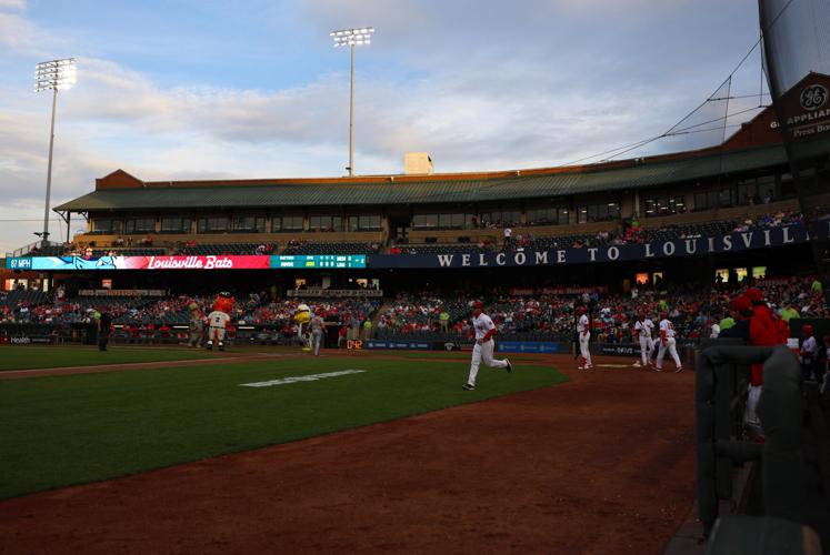 Players run out onto Slugger Field.JPG