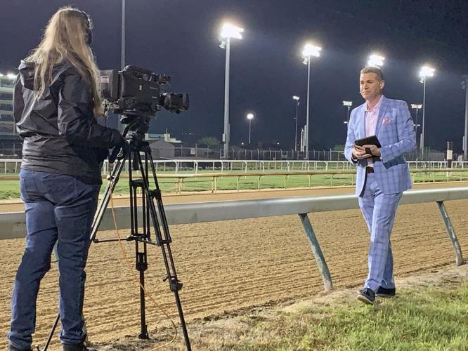 Camera Operator Katherine Vieth and Meteorologist Jude Redfield at the Churchill Downs Backside