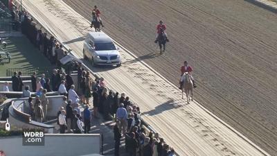VIDEO: John Asher honored with procession around the Churchill Downs track