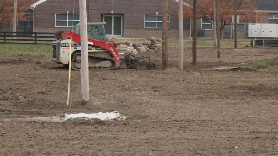 Crews re-forest vacant land at Alberta O. Jones Park in west Louisville