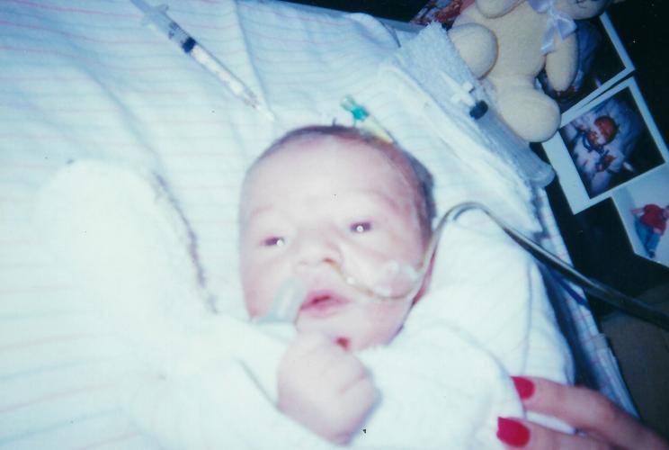 Rice's son Logan undergoes life-saving surgery hours after birth