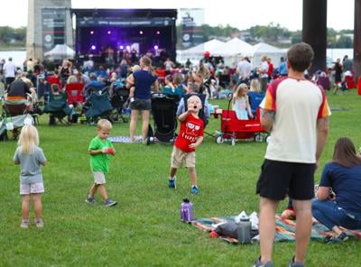 Child tosses ball at Waterfront Wednesday - Sept. 25, 2024.JPG