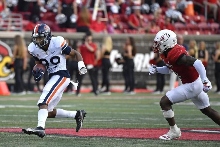 Virginia wide receiver Keytaon Thompson is chased by Qwynnterrio Cole.jpeg