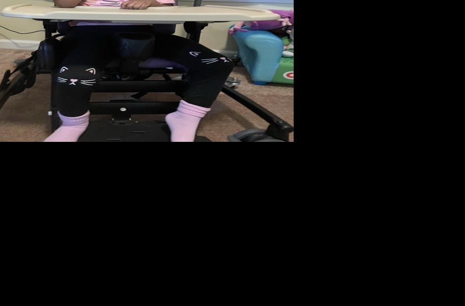 Ocean Robertson feeding herself