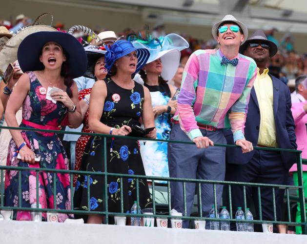 Crowd watches race at Churchill Downs.JPG